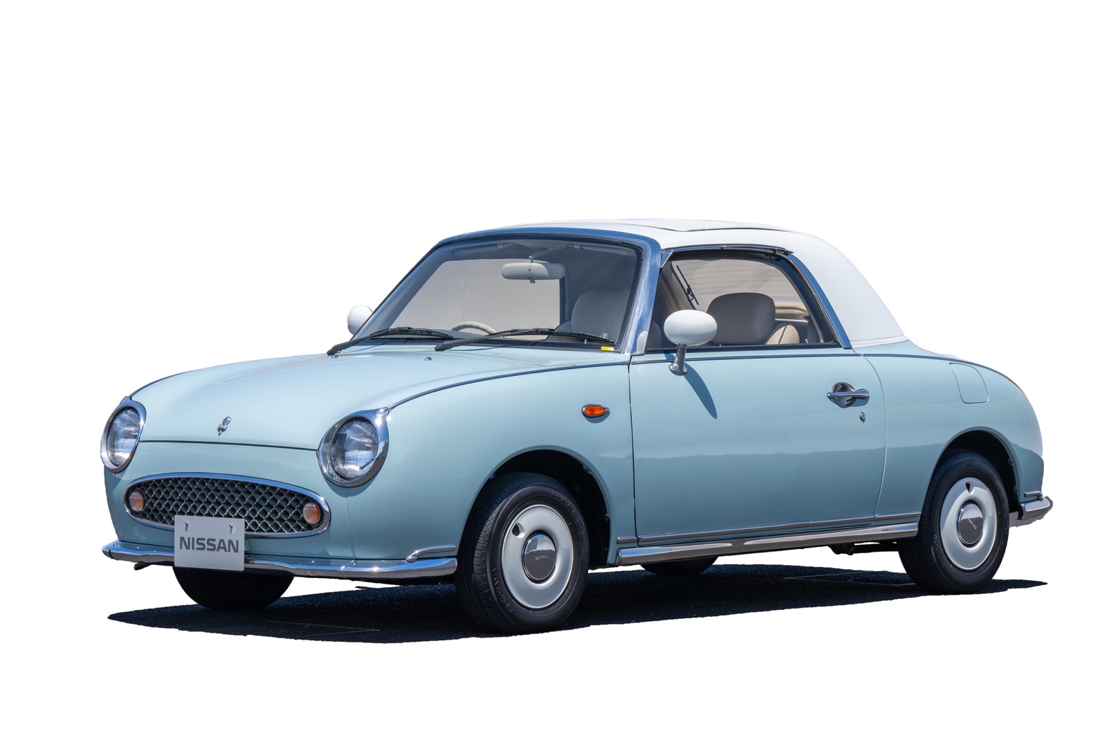淡いブルーの日産フィガロ